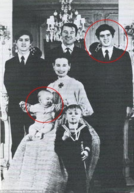 Christopher Stokowski (circled standing) and Anderson Cooper (circled infant)